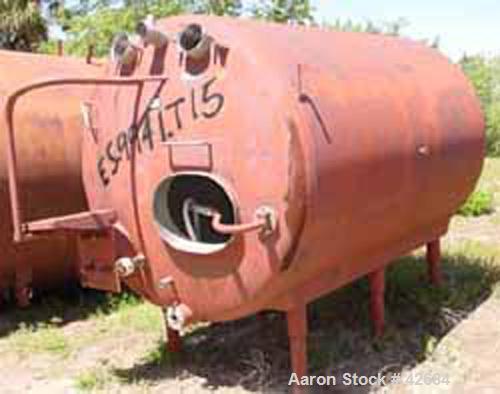 Used Cherry Burrell Tank, 1500 Gallon, Stainless Steel, Horizontal. 72" Diameter x 98" straight side, dished ends. Insulated, carbon steel shell. End bottom 3 blade agitator blade, no motor. Openings...