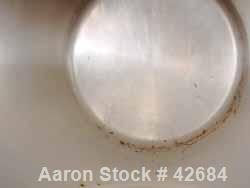 Used Cherry Burrell Tank, 1500 Gallon, Stainless Steel, Horizontal. 72" Diameter x 98" straight side, dished ends. Insulated, carbon steel shell. End bottom 3 blade agitator blade, no motor. Openings...