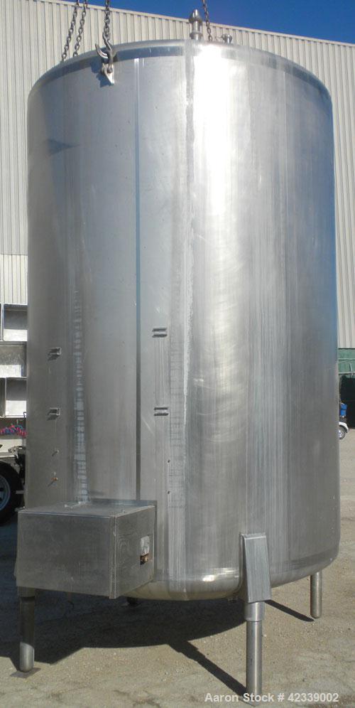 Used Cherry-Burrell Tank, 3000 Gallon, 304 Stainless Steel, Vertical. 84" Diameter x 116" straight side, dish top and bottom. Internal CIP spray ball. Side bottom agitator with a 3 blade prop, driven...