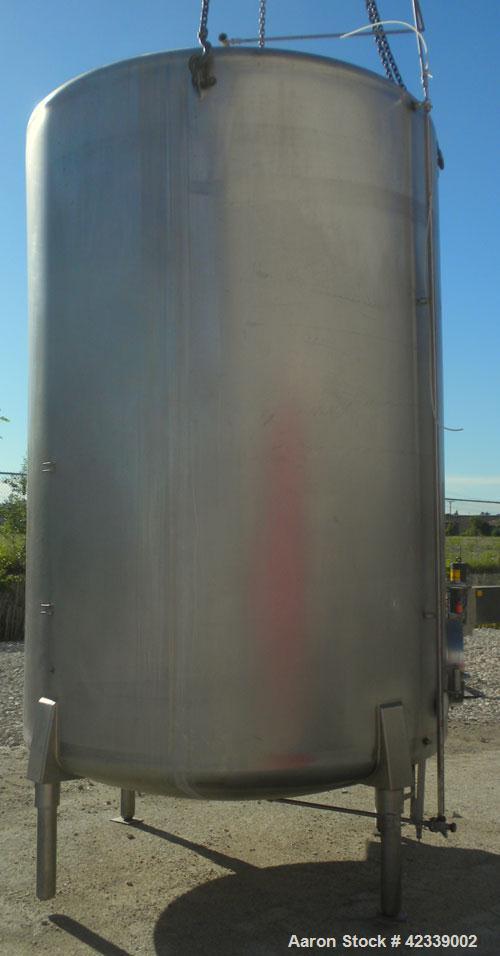 Used Cherry-Burrell Tank, 3000 Gallon, 304 Stainless Steel, Vertical. 84" Diameter x 116" straight side, dish top and bottom. Internal CIP spray ball. Side bottom agitator with a 3 blade prop, driven...