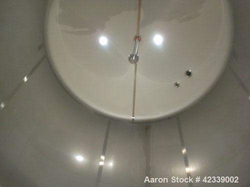 Used Cherry-Burrell Tank, 3000 Gallon, 304 Stainless Steel, Vertical. 84" Diameter x 116" straight side, dish top and bottom. Internal CIP spray ball. Side bottom agitator with a 3 blade prop, driven...