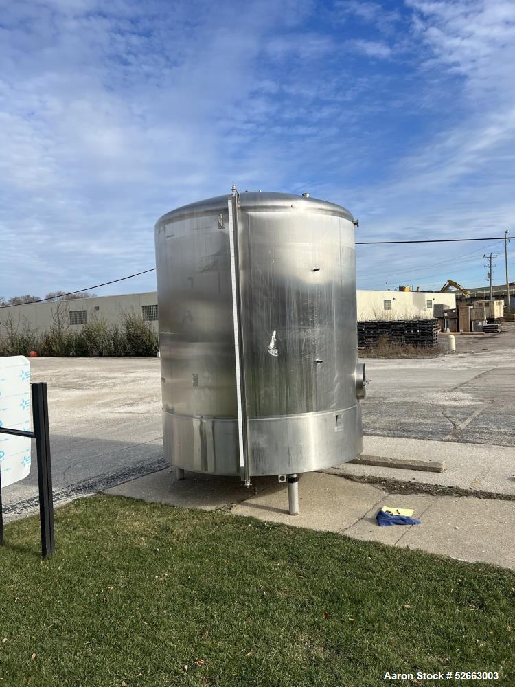 Used Cherry Burrell Model CV- 3000 Gallon Stainless Steel Vertical Tank. Approx. 95" Diameter x 96" Straight Side (weld to weld). Dished Heads. Center Bottom Outlet. Side Oval Manway is 16" x 20". Mo...