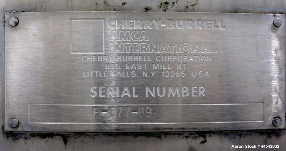 Used Cherry Burrell Tank, 2000 Gallon, 304 Stainless Steel, Vertical. 84” Diameter x 81” straight side, dished top, sloped bottom. (1) Spray ball, external side ladder. Openings: top (2) 2”, 3”, 3" v...
