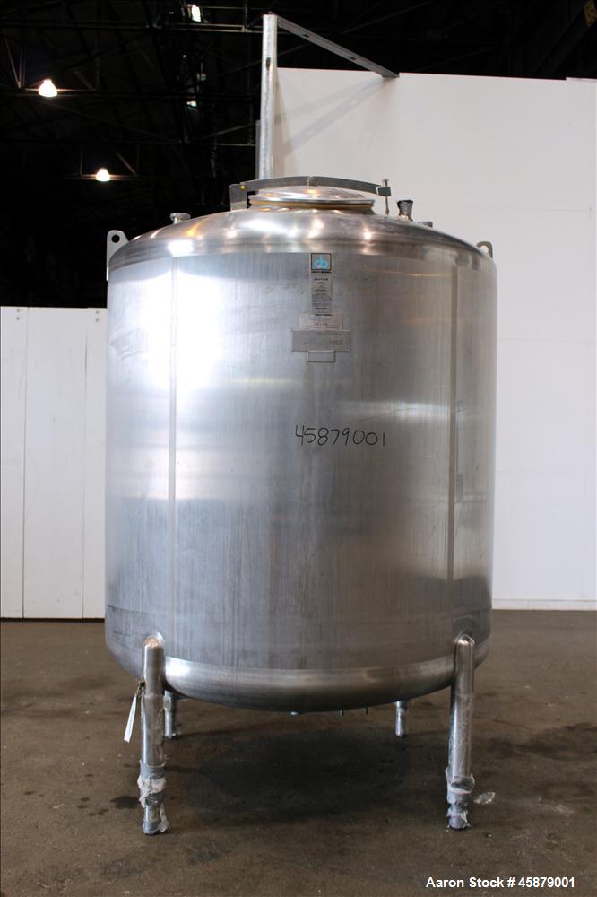 Used Cherry Burrell Type C Tank, Model CVS, 1,000 Gallon, 304 Stainless Steel, Vertical. Approximately 64" diameter x 60" straight side. Dished top and bottom. Design pressure 7 psi. Top openings: 17...