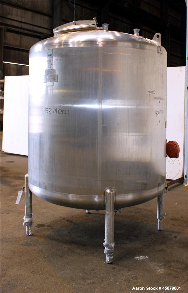 Used Cherry Burrell Type C Tank, Model CVS, 1,000 Gallon, 304 Stainless Steel, Vertical. Approximately 64" diameter x 60" straight side. Dished top and bottom. Design pressure 7 psi. Top openings: 17...