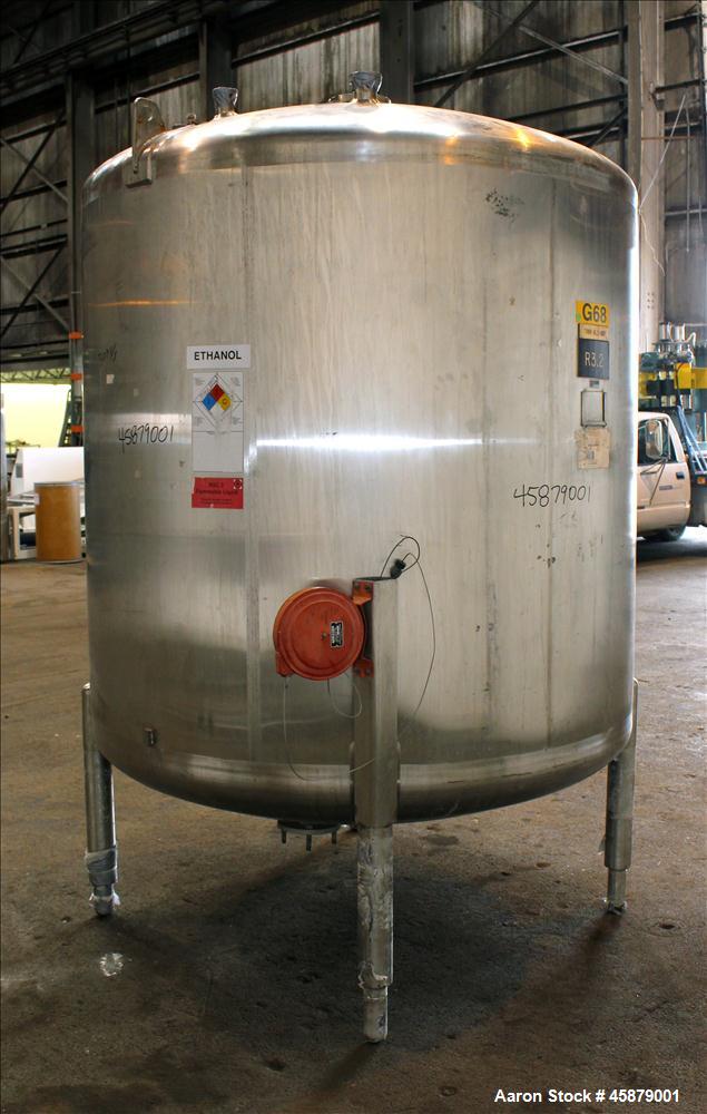 Used Cherry Burrell Type C Tank, Model CVS, 1,000 Gallon, 304 Stainless Steel, Vertical. Approximately 64" diameter x 60" straight side. Dished top and bottom. Design pressure 7 psi. Top openings: 17...