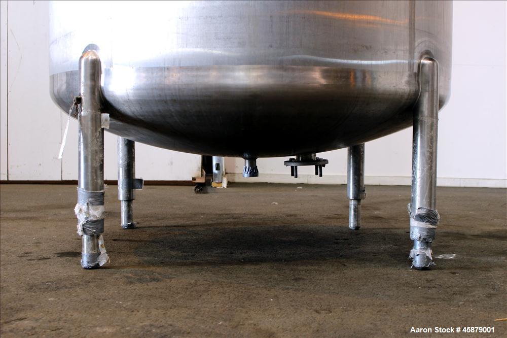 Used Cherry Burrell Type C Tank, Model CVS, 1,000 Gallon, 304 Stainless Steel, Vertical. Approximately 64" diameter x 60" straight side. Dished top and bottom. Design pressure 7 psi. Top openings: 17...