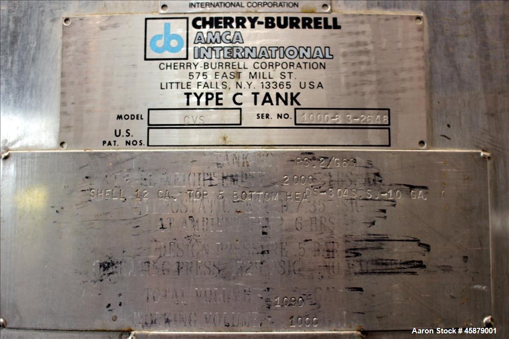 Used Cherry Burrell Type C Tank, Model CVS, 1,000 Gallon, 304 Stainless Steel, Vertical. Approximately 64" diameter x 60" straight side. Dished top and bottom. Design pressure 7 psi. Top openings: 17...