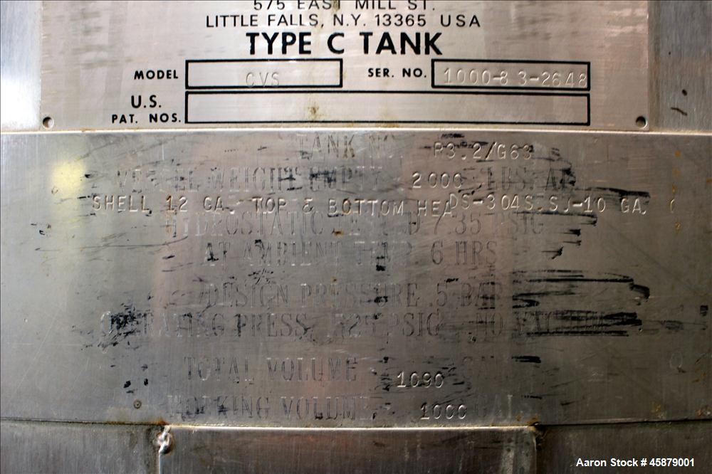 Used Cherry Burrell Type C Tank, Model CVS, 1,000 Gallon, 304 Stainless Steel, Vertical. Approximately 64" diameter x 60" straight side. Dished top and bottom. Design pressure 7 psi. Top openings: 17...