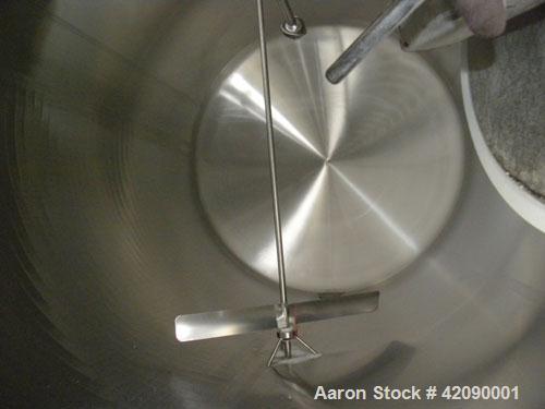 Used Cherry Burrell Storage Tank, 3000 gallon, model GHW, 304 stainless steel, horizontal. 84" diameter x 108" straight side, dished heads. Insulated with carbon steel sheathing. 1/4 channel jacket o...
