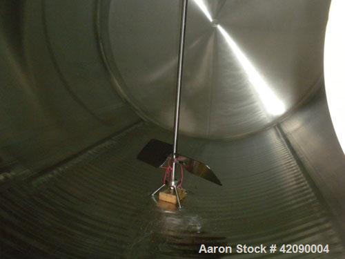 Used Cherry Burrell Storage Tank, 3000 gallon, 304 stainless steel, horizontal. 84'' diameter x 108'' straight side, dished heads. Insulated with carbon steel sheathing. 1/4 channel jacket on partial...