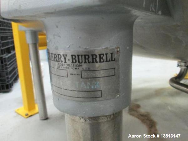 Used Cherry Burrell Stainless Steel Tank with  5 hp side agitator, 8' straight wall, 9' diameter, 15' overall length, domed top/bottom, (6) stainless steel legs, top and front manways, center bottom ...