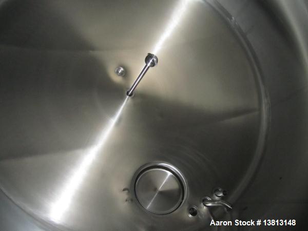 Used Cherry Burrell Stainless Steel Tank with  5 hp side agitator, 8' straight wall, 9' diameter, 15' overall length, domed top/bottom, (6) stainless steel legs, top and front manways, center bottom ...