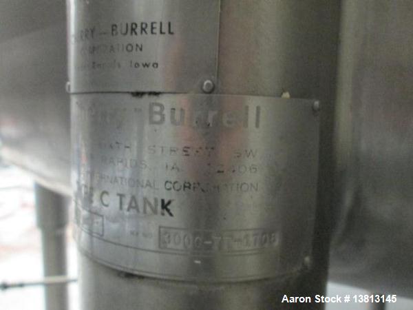 Used Cherry Burrell Stainless Steel Tank with type C side agitator, 9'6" straight wall, 84" diameter, 12' overall length, domed top/bottom, (6) stainless steel legs, 2.5" center bottom discharge, sin...