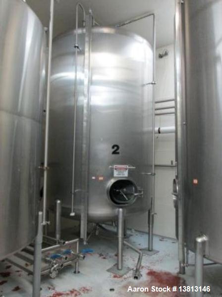Used Cherry Burrell Stainless Steel Tank with 1.5 hp side agitator, 9'4" straight wall, 84" diameter, 12' overall length, domed top/bottom, (6) stainless steel legs, 2.5" center bottom discharge, CIP...