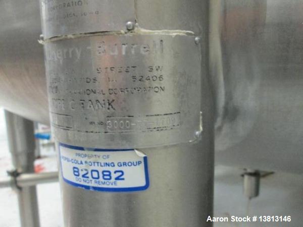 Used Cherry Burrell Stainless Steel Tank with 1.5 hp side agitator, 9'4" straight wall, 84" diameter, 12' overall length, domed top/bottom, (6) stainless steel legs, 2.5" center bottom discharge, CIP...