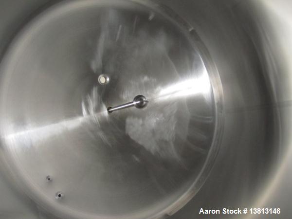Used Cherry Burrell Stainless Steel Tank with 1.5 hp side agitator, 9'4" straight wall, 84" diameter, 12' overall length, domed top/bottom, (6) stainless steel legs, 2.5" center bottom discharge, CIP...