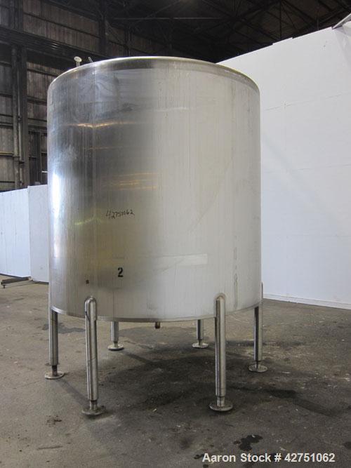 Used Cherry-Burrell Tank, 2000 Gallon, 316 Stainless Steel, Vertical. 84" Diameter x 84" straight side. Dished top, coned bottom. Off center top entering Lightnin agitator, 1-1/2" diameter shaft with...