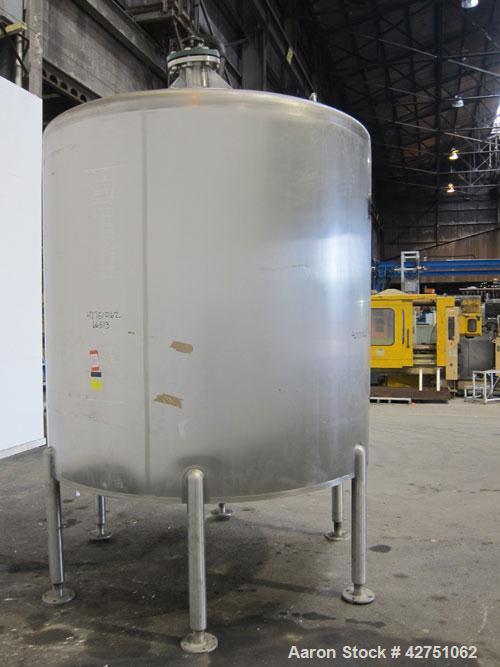 Used Cherry-Burrell Tank, 2000 Gallon, 316 Stainless Steel, Vertical. 84" Diameter x 84" straight side. Dished top, coned bottom. Off center top entering Lightnin agitator, 1-1/2" diameter shaft with...