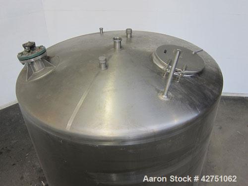 Used Cherry-Burrell Tank, 2000 Gallon, 316 Stainless Steel, Vertical. 84" Diameter x 84" straight side. Dished top, coned bottom. Off center top entering Lightnin agitator, 1-1/2" diameter shaft with...