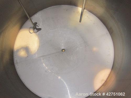 Used Cherry-Burrell Tank, 2000 Gallon, 316 Stainless Steel, Vertical. 84" Diameter x 84" straight side. Dished top, coned bottom. Off center top entering Lightnin agitator, 1-1/2" diameter shaft with...