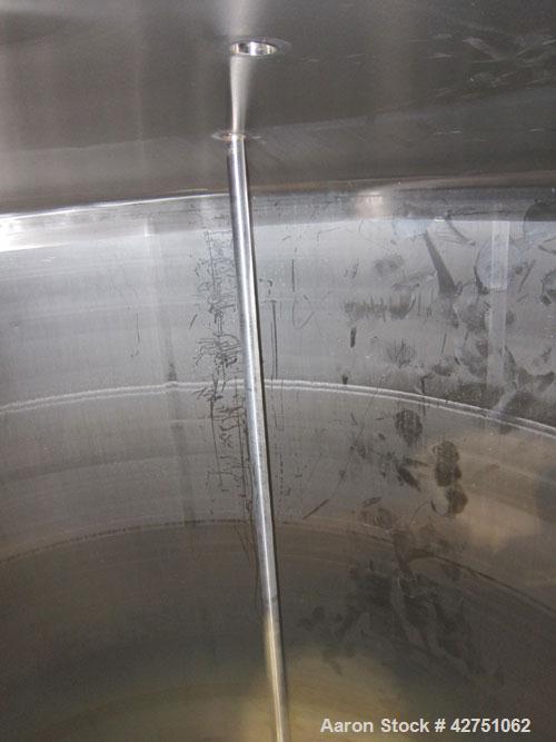 Used Cherry-Burrell Tank, 2000 Gallon, 316 Stainless Steel, Vertical. 84" Diameter x 84" straight side. Dished top, coned bottom. Off center top entering Lightnin agitator, 1-1/2" diameter shaft with...