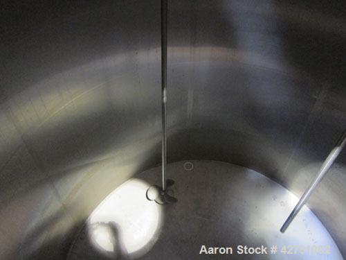 Used Cherry-Burrell Tank, 2000 Gallon, 316 Stainless Steel, Vertical. 84" Diameter x 84" straight side. Dished top, coned bottom. Off center top entering Lightnin agitator, 1-1/2" diameter shaft with...
