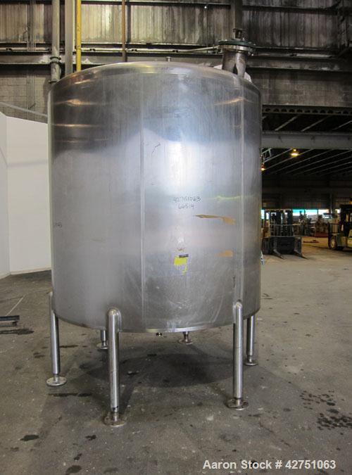 Used Cherry-Burrell Tank, 2000 Gallon, 316 Stainless Steel, Vertical. 84" Diameter x 84" straight side. Dished top, coned bottom. Off center top entering Lightnin agitator, 1-1/2" diameter shaft with...