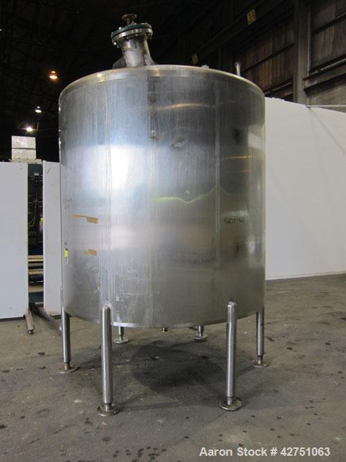 Used Cherry-Burrell Tank, 2000 Gallon, 316 Stainless Steel, Vertical. 84" Diameter x 84" straight side. Dished top, coned bottom. Off center top entering Lightnin agitator, 1-1/2" diameter shaft with...