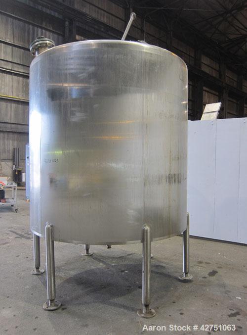 Used Cherry-Burrell Tank, 2000 Gallon, 316 Stainless Steel, Vertical. 84" Diameter x 84" straight side. Dished top, coned bottom. Off center top entering Lightnin agitator, 1-1/2" diameter shaft with...