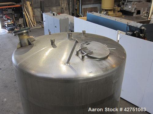 Used Cherry-Burrell Tank, 2000 Gallon, 316 Stainless Steel, Vertical. 84" Diameter x 84" straight side. Dished top, coned bottom. Off center top entering Lightnin agitator, 1-1/2" diameter shaft with...