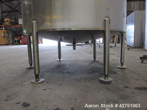 Used Cherry-Burrell Tank, 2000 Gallon, 316 Stainless Steel, Vertical. 84" Diameter x 84" straight side. Dished top, coned bottom. Off center top entering Lightnin agitator, 1-1/2" diameter shaft with...