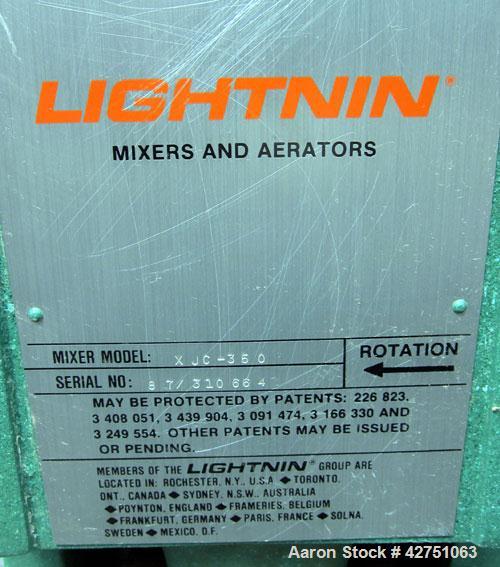 Used Cherry-Burrell Tank, 2000 Gallon, 316 Stainless Steel, Vertical. 84" Diameter x 84" straight side. Dished top, coned bottom. Off center top entering Lightnin agitator, 1-1/2" diameter shaft with...