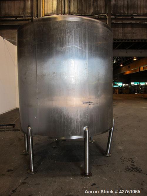 Used Cherry-Burrell Tank, 2000 Gallon, 316 Stainless Steel, Vertical. 84" Diameter x 84" straight side. Dished top, coned bottom. Openings top 1-1/2" tri-clamp, 3", (2) 2" NPT, 6", 18" man way with c...