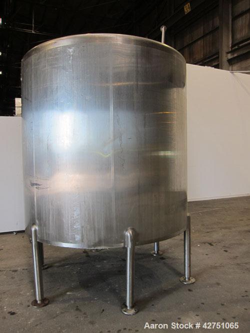 Used Cherry-Burrell Tank, 2000 Gallon, 316 Stainless Steel, Vertical. 84" Diameter x 84" straight side. Dished top, coned bottom. Openings top 1-1/2" tri-clamp, 3", (2) 2" NPT, 6", 18" man way with c...