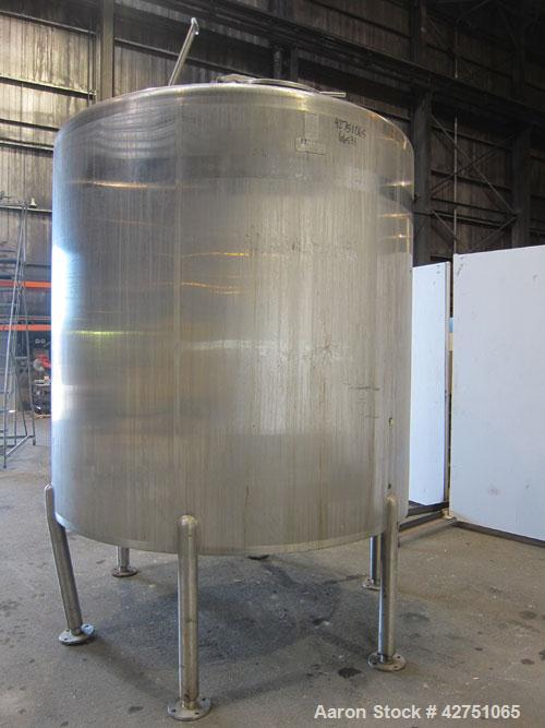 Used Cherry-Burrell Tank, 2000 Gallon, 316 Stainless Steel, Vertical. 84" Diameter x 84" straight side. Dished top, coned bottom. Openings top 1-1/2" tri-clamp, 3", (2) 2" NPT, 6", 18" man way with c...