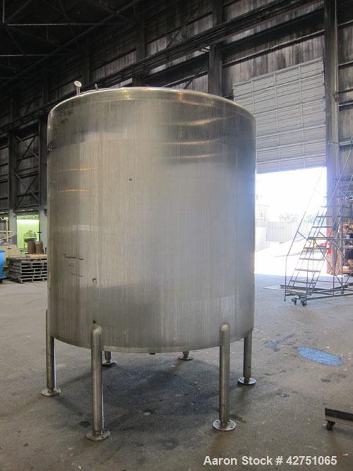 Used Cherry-Burrell Tank, 2000 Gallon, 316 Stainless Steel, Vertical. 84" Diameter x 84" straight side. Dished top, coned bottom. Openings top 1-1/2" tri-clamp, 3", (2) 2" NPT, 6", 18" man way with c...