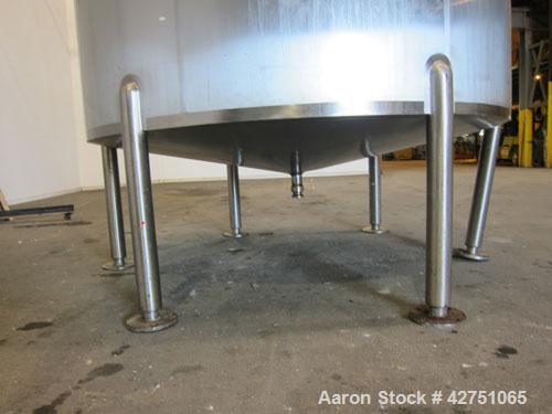 Used Cherry-Burrell Tank, 2000 Gallon, 316 Stainless Steel, Vertical. 84" Diameter x 84" straight side. Dished top, coned bottom. Openings top 1-1/2" tri-clamp, 3", (2) 2" NPT, 6", 18" man way with c...
