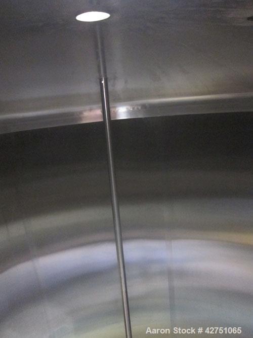 Used Cherry-Burrell Tank, 2000 Gallon, 316 Stainless Steel, Vertical. 84" Diameter x 84" straight side. Dished top, coned bottom. Openings top 1-1/2" tri-clamp, 3", (2) 2" NPT, 6", 18" man way with c...