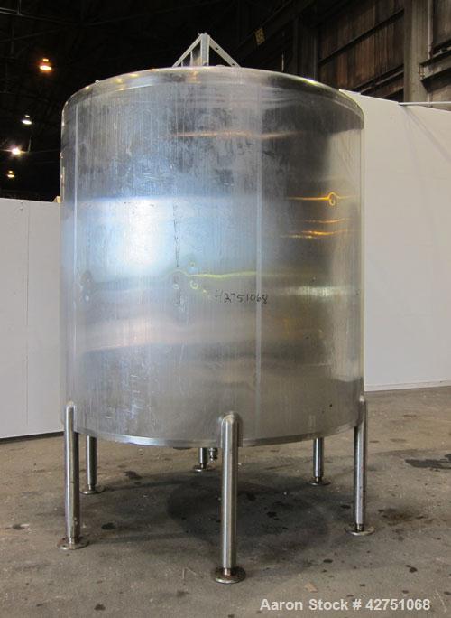 Used Cherry-Burrell Tank, 2000 Gallon, 316 Stainless Steel, Vertical. 84" Diameter x 84" straight side. Dished top, coned bottom. Openings top 1-1/2" tri-clamp, 3", (2) 2" NPT, 6", 18" man way with c...