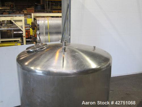 Used Cherry-Burrell Tank, 2000 Gallon, 316 Stainless Steel, Vertical. 84" Diameter x 84" straight side. Dished top, coned bottom. Openings top 1-1/2" tri-clamp, 3", (2) 2" NPT, 6", 18" man way with c...