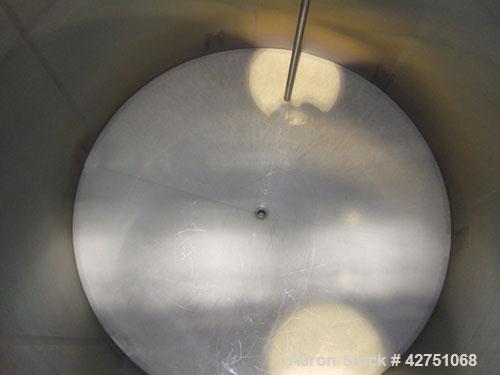 Used Cherry-Burrell Tank, 2000 Gallon, 316 Stainless Steel, Vertical. 84" Diameter x 84" straight side. Dished top, coned bottom. Openings top 1-1/2" tri-clamp, 3", (2) 2" NPT, 6", 18" man way with c...