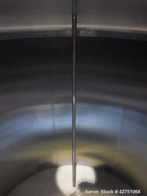 Used Cherry-Burrell Tank, 2000 Gallon, 316 Stainless Steel, Vertical. 84" Diameter x 84" straight side. Dished top, coned bottom. Openings top 1-1/2" tri-clamp, 3", (2) 2" NPT, 6", 18" man way with c...