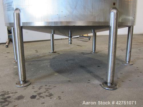 Used Cherry-Burrell Tank, 2000 Gallon, 316 Stainless Steel, Vertical. 84" Diameter x 84" straight side. Dished top, coned bottom. Openings top 1-1/2" tri-clamp, 3", (2) 2" NPT, 6", 18" man way with c...