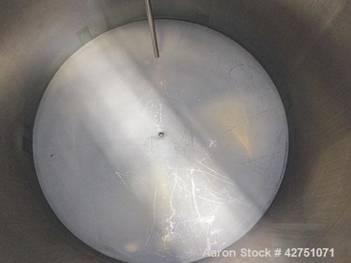 Used Cherry-Burrell Tank, 2000 Gallon, 316 Stainless Steel, Vertical. 84" Diameter x 84" straight side. Dished top, coned bottom. Openings top 1-1/2" tri-clamp, 3", (2) 2" NPT, 6", 18" man way with c...