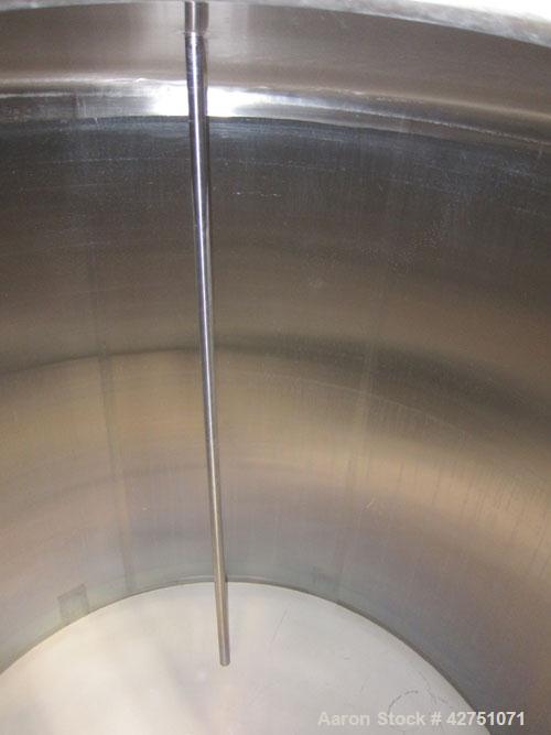 Used Cherry-Burrell Tank, 2000 Gallon, 316 Stainless Steel, Vertical. 84" Diameter x 84" straight side. Dished top, coned bottom. Openings top 1-1/2" tri-clamp, 3", (2) 2" NPT, 6", 18" man way with c...