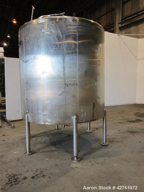 Used Cherry-Burrell Tank, 2000 Gallon, 316 Stainless Steel, Vertical. 84" Diameter x 84" straight side. Dished top, coned bottom. Openings top 1-1/2" tri-clamp, 3", (2) 2" NPT, 6", 18" man way with c...