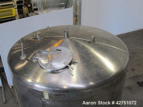 Used Cherry-Burrell Tank, 2000 Gallon, 316 Stainless Steel, Vertical. 84" Diameter x 84" straight side. Dished top, coned bottom. Openings top 1-1/2" tri-clamp, 3", (2) 2" NPT, 6", 18" man way with c...