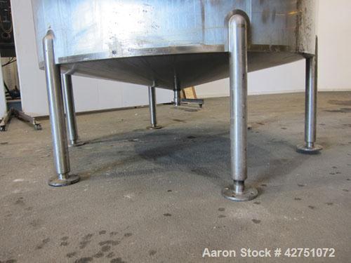 Used Cherry-Burrell Tank, 2000 Gallon, 316 Stainless Steel, Vertical. 84" Diameter x 84" straight side. Dished top, coned bottom. Openings top 1-1/2" tri-clamp, 3", (2) 2" NPT, 6", 18" man way with c...