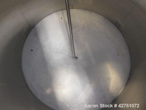 Used Cherry-Burrell Tank, 2000 Gallon, 316 Stainless Steel, Vertical. 84" Diameter x 84" straight side. Dished top, coned bottom. Openings top 1-1/2" tri-clamp, 3", (2) 2" NPT, 6", 18" man way with c...